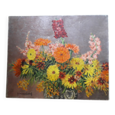 An old oil painting depicting a bouquet of flowers.