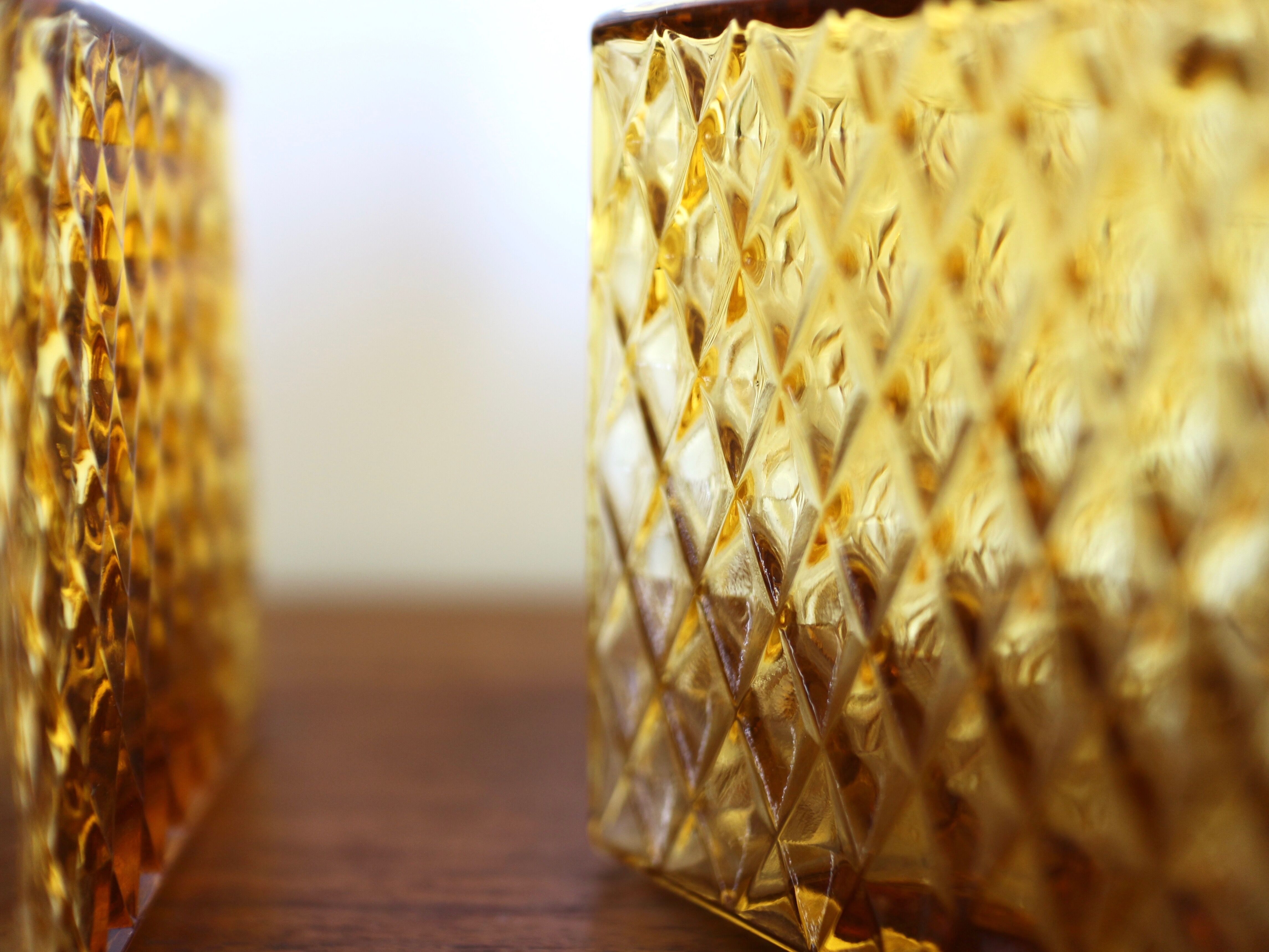 2 yellow glass whiskey carafes