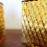 2 yellow glass whiskey carafes