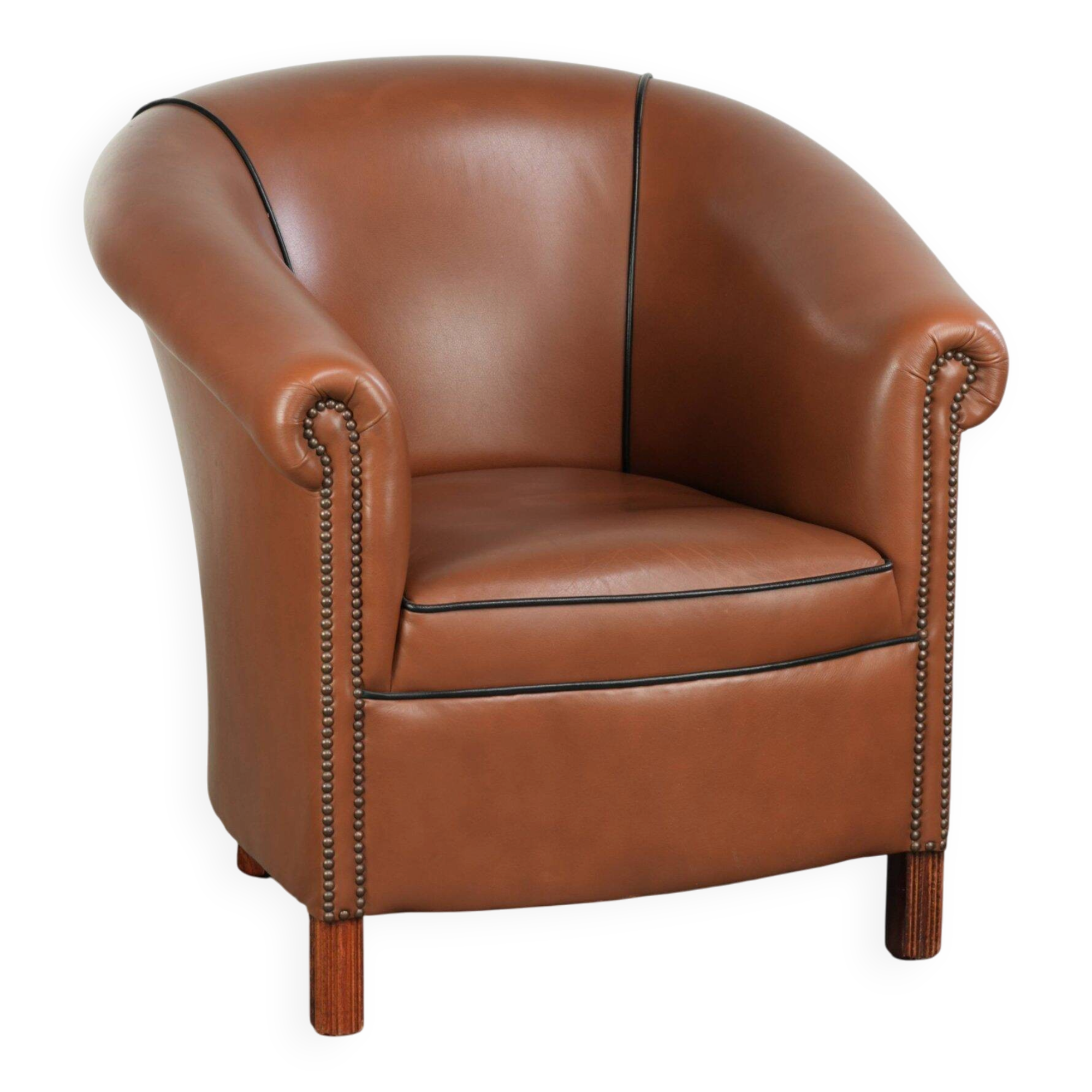 Cowhide club armchair in English style with comfortable seating.