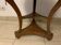 Empire-style tripode healing in mahogany top of marble gallery