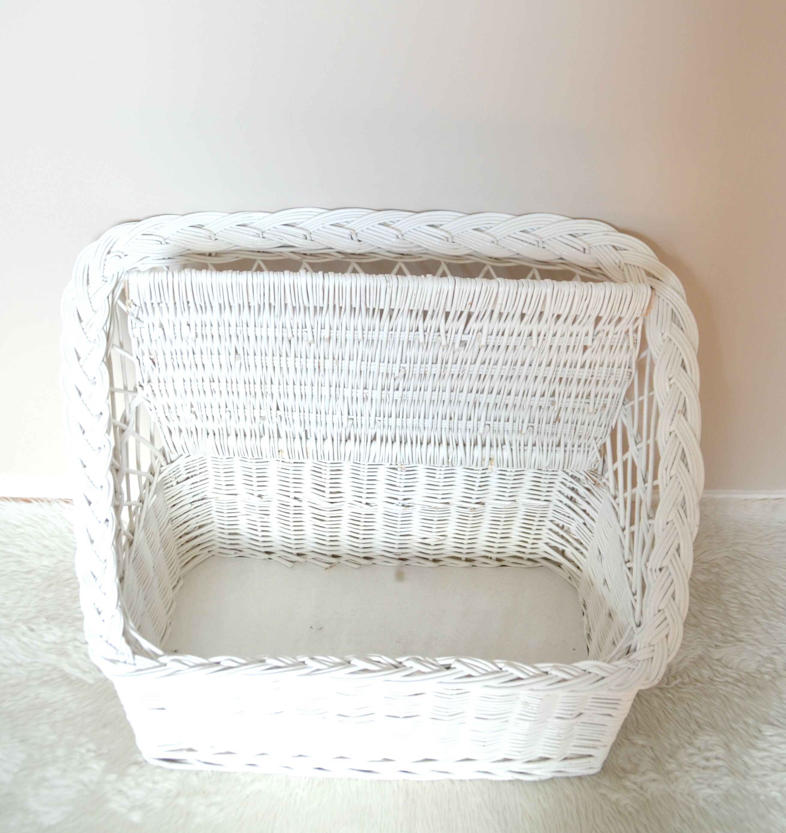 White vintage rattan toy box