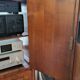High sideboard in rosewood and marble slab, Louis XVI style, French