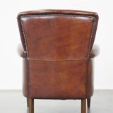 Sheep leather armchair correctly finished with decorative nails