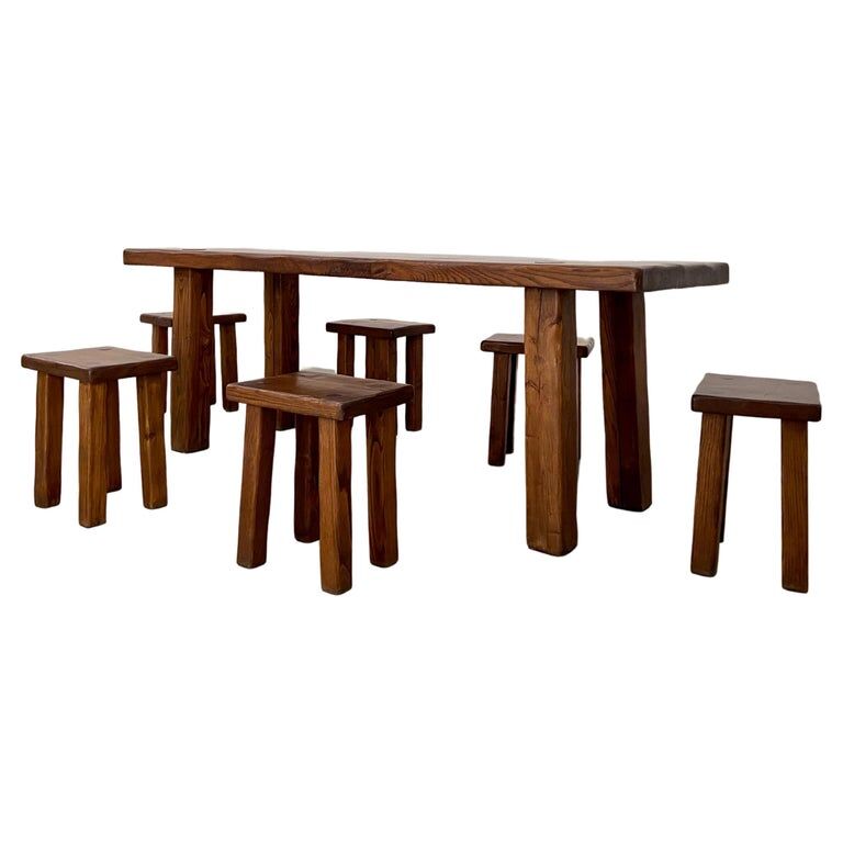 Solid elm dining set including 6 stools France 1970s