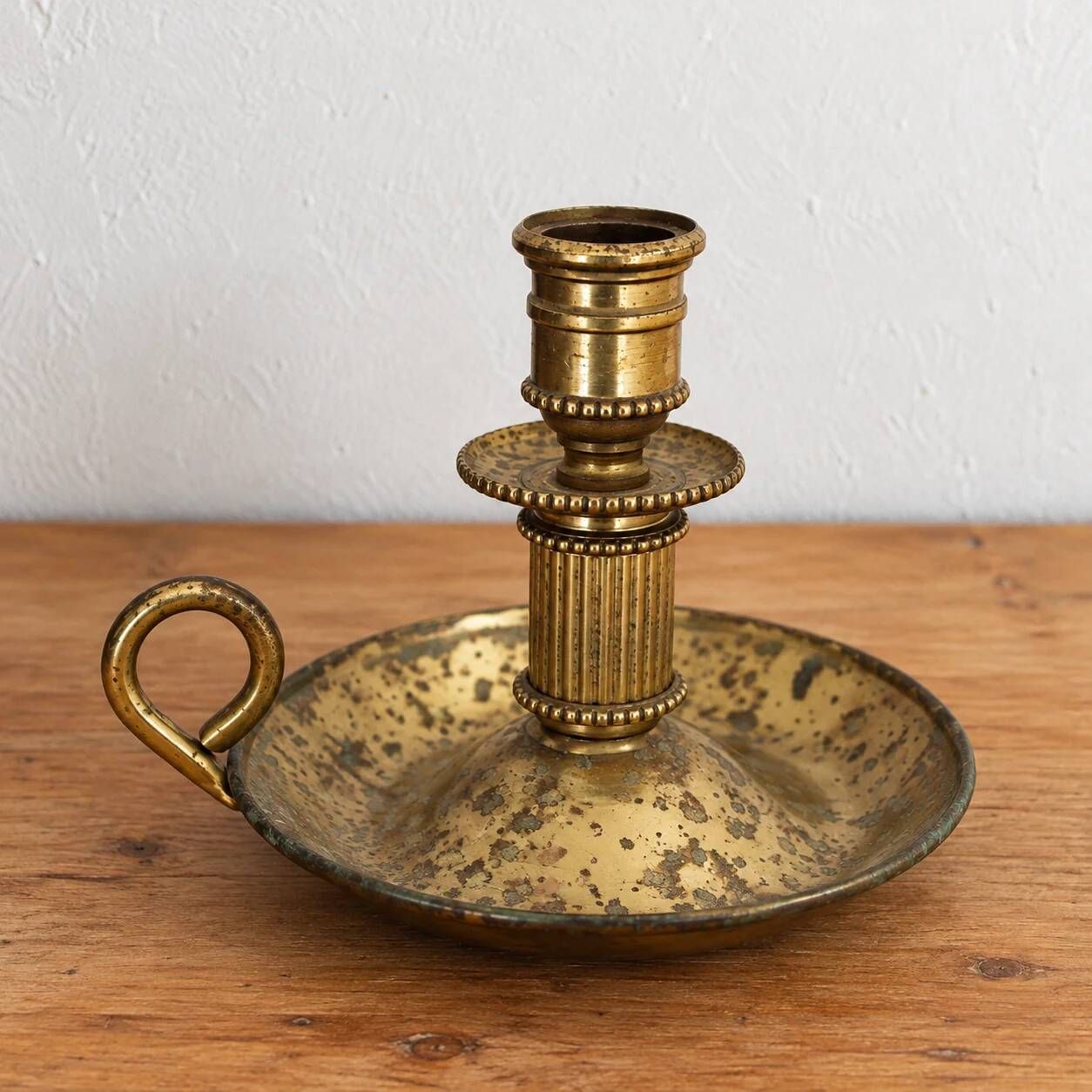 Antique brass hand candlestick – Columned fluted cellar rat