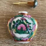 Small bottle for tobacco