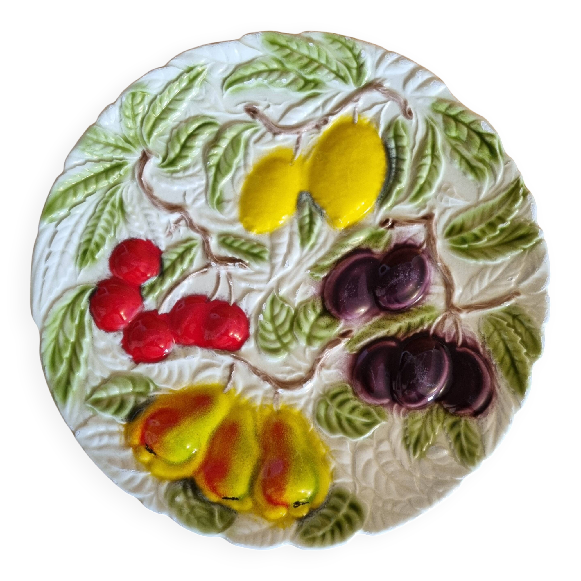 Large vintage earthenware dish with a fruit pattern.