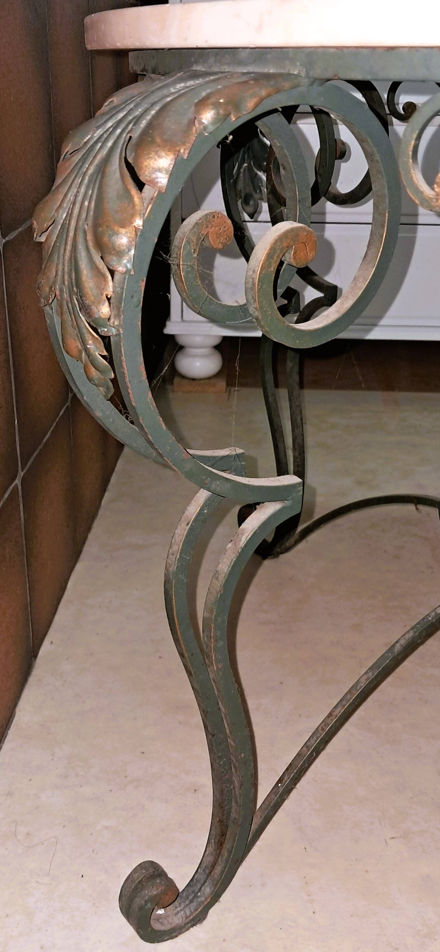 marble and wrought iron coffee table