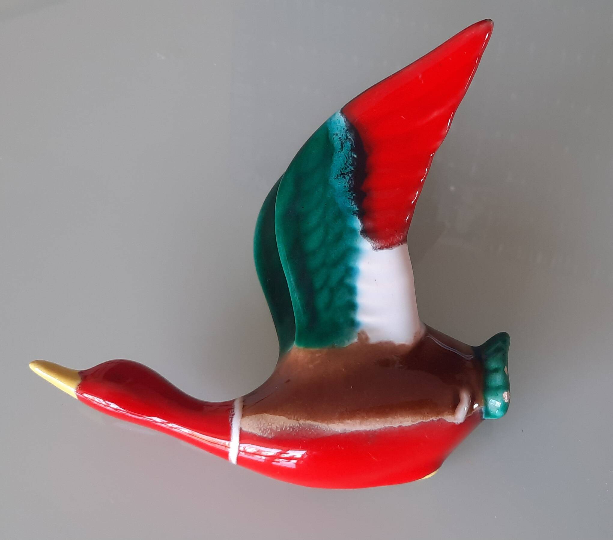 Pair of glazed ceramic wall ducks