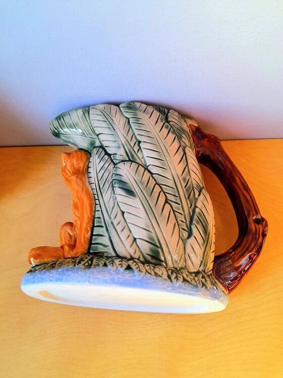 Zoomorphic pitcher in slipware, monkey.