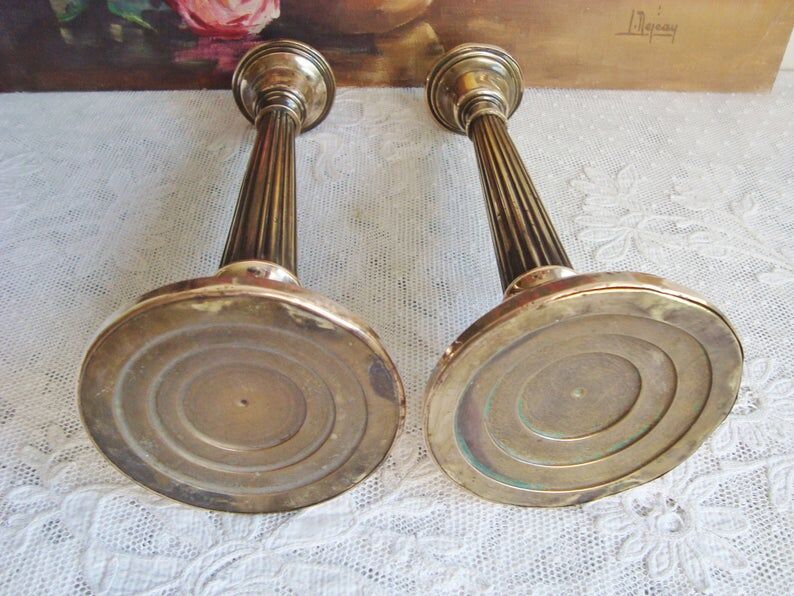 Pair of very old brass candlesticks