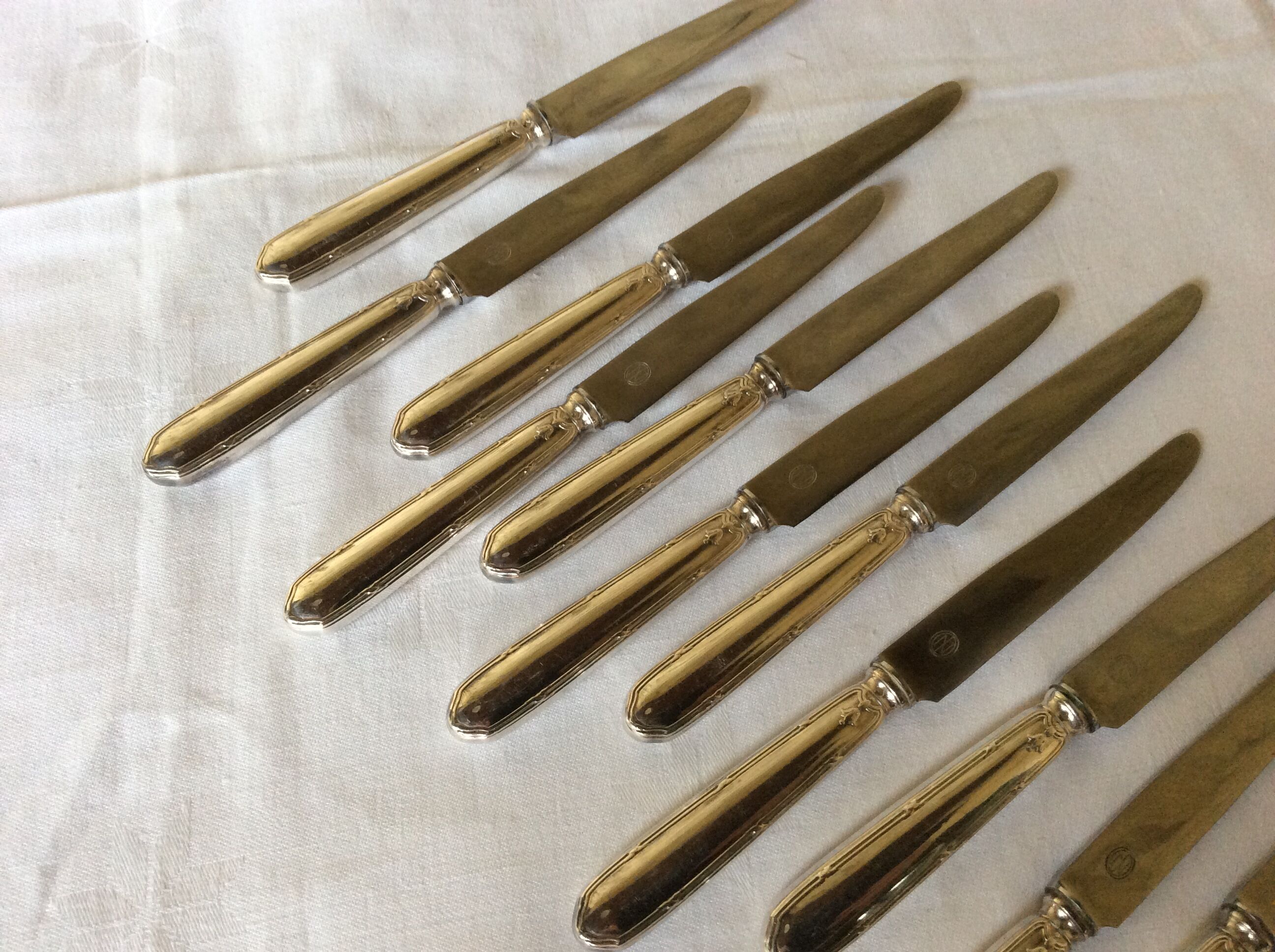12 entremet knives, silver metal, cross ribbons