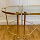 Table basse tripartite en laiton et verre