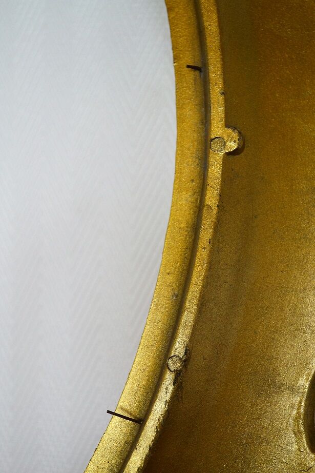 Oval frame in golden resin