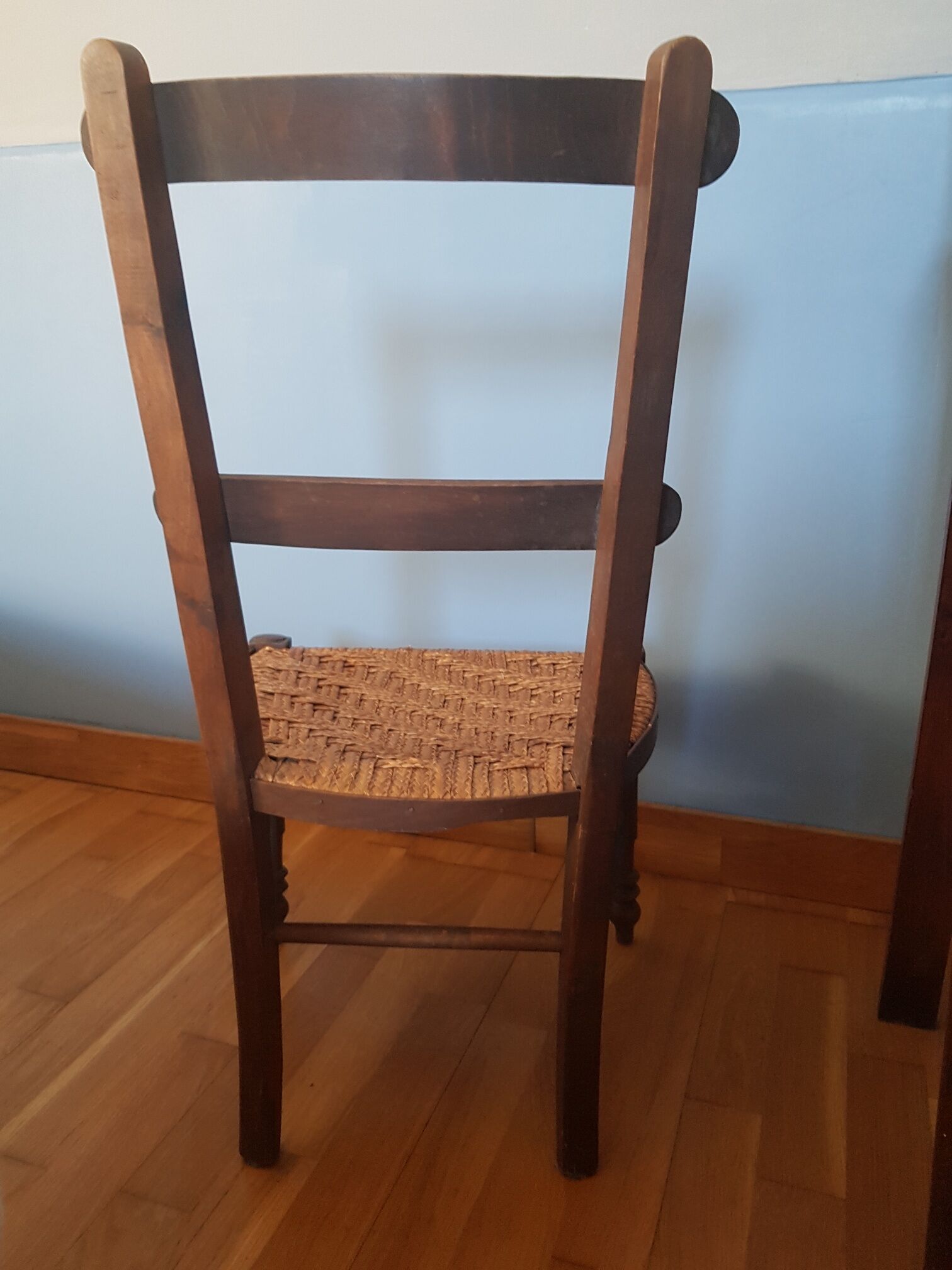 Antique chair low seat braided