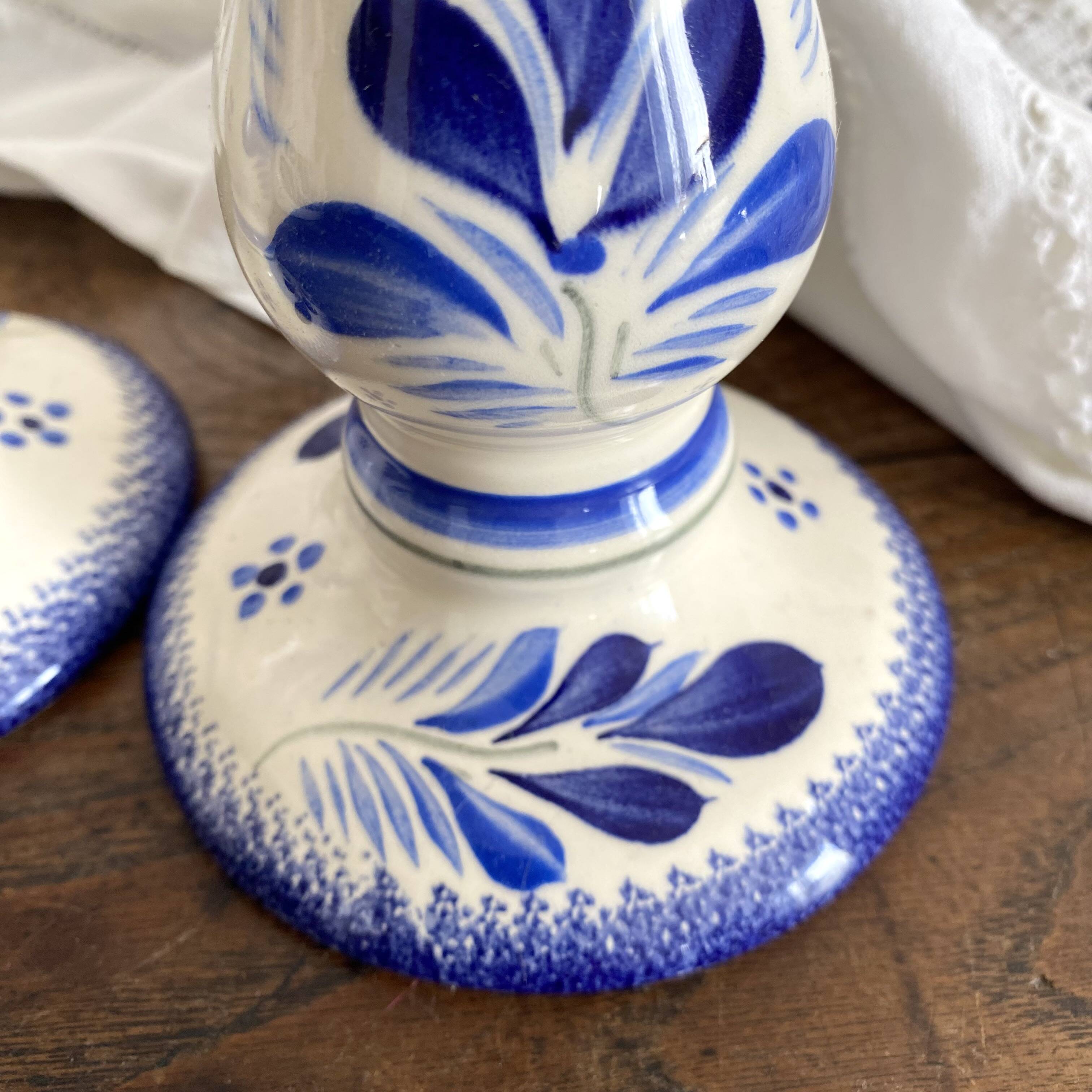 Pair of Quimper earthenware candlesticks