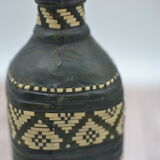 Set of 2 decorative vintage bottles covered with leather & wicker