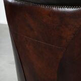Characterful and comfortable cowhide leather armchair