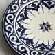 Raised dish, ceramic plate with blue and white patterns.