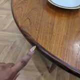 Round and extendable dining table published by G-Plan