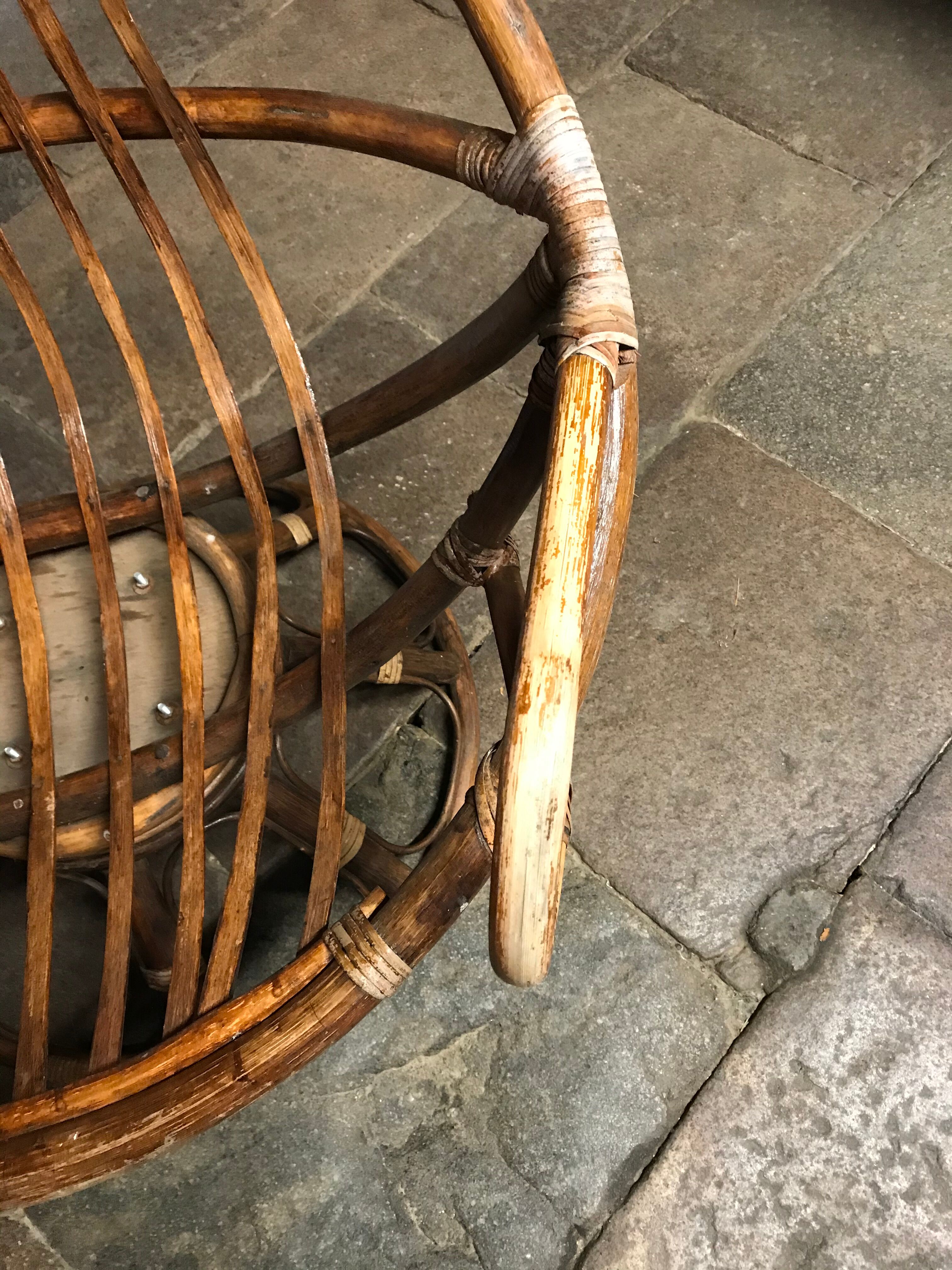 Swivel rattan armchair