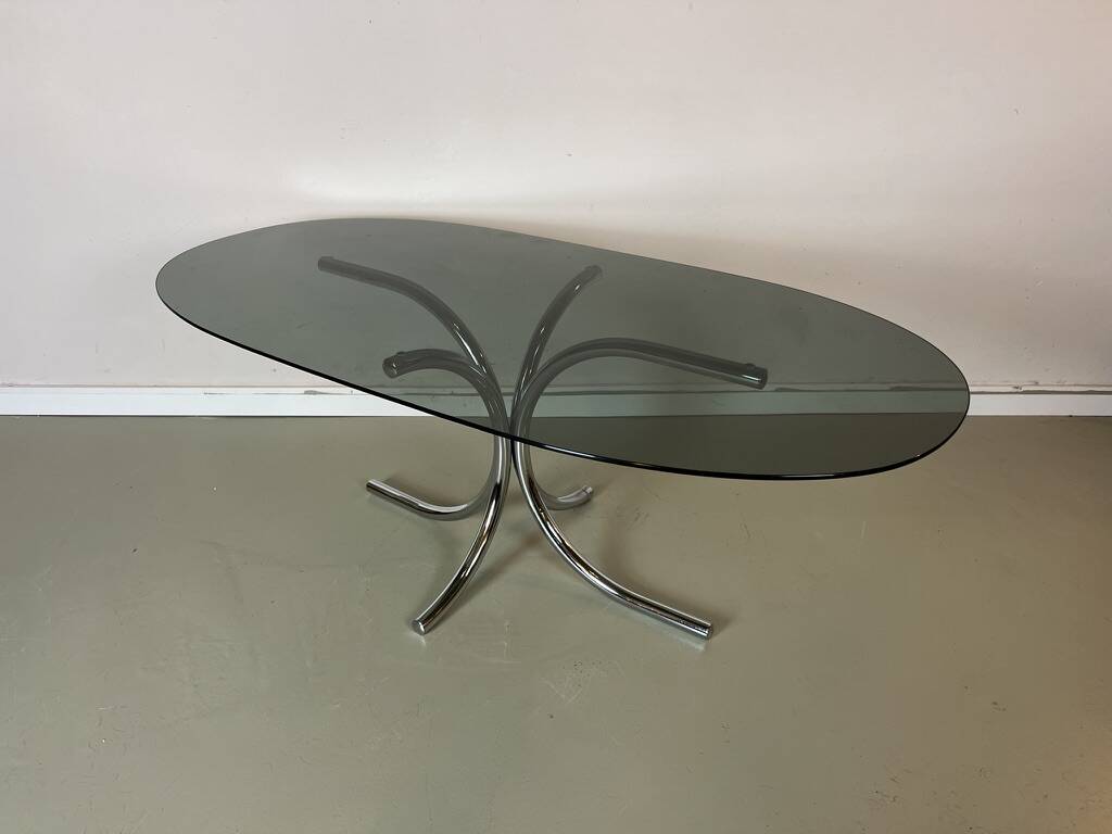 Vintage coffee table from the 70s in smoked glass and chrome, oval, Space Age style.