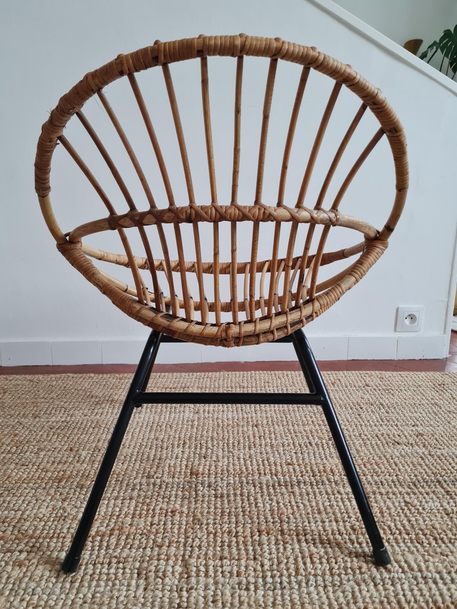 Vintage rattan shell armchair from the 60s