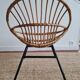 Vintage rattan shell armchair from the 60s