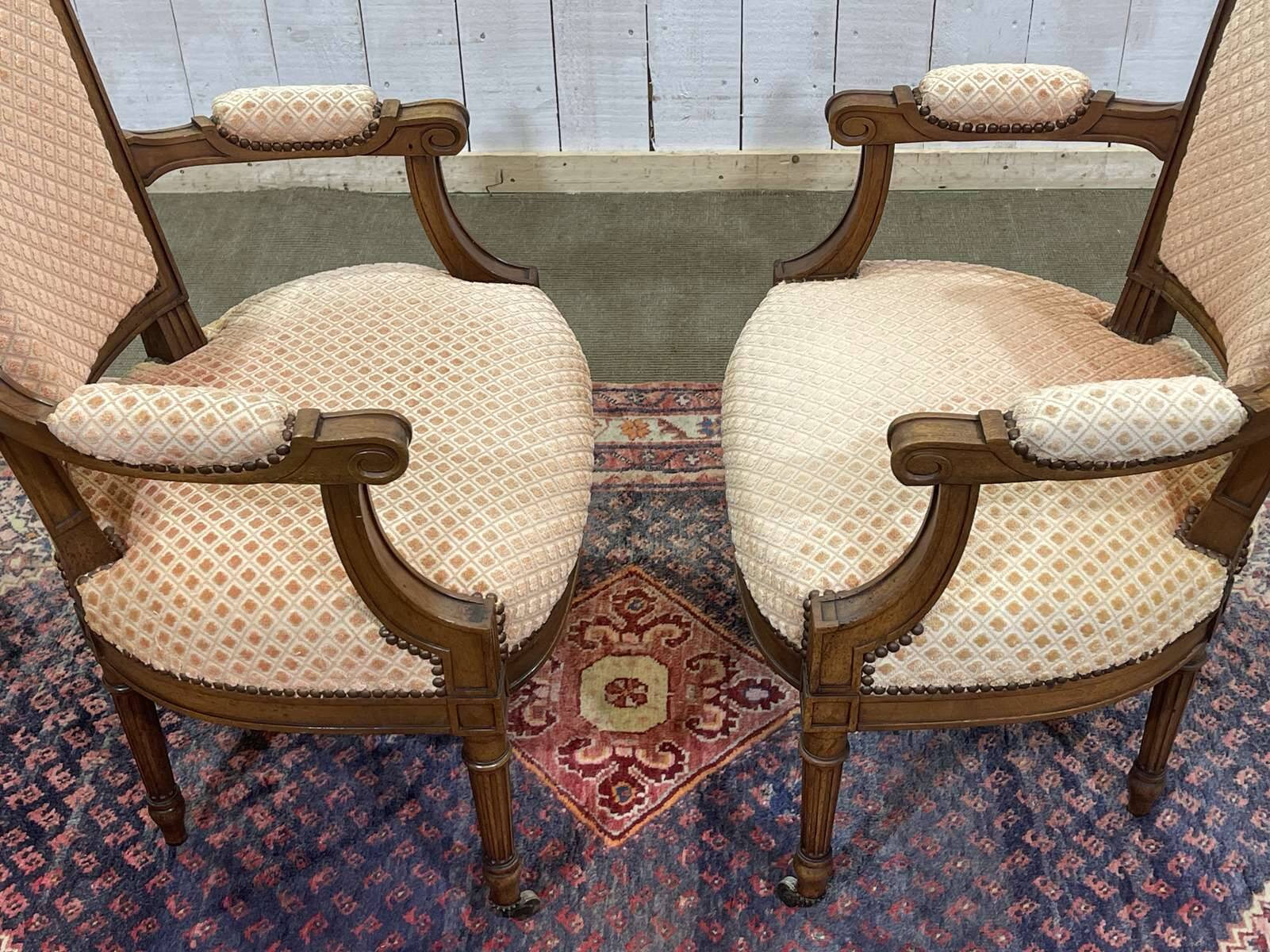 Pair of early 20th century Louis XVI armchairs in walnut