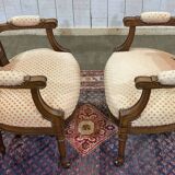 Pair of early 20th century Louis XVI armchairs in walnut