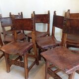 Set of 8 walnut and leather chairs from the 1950s