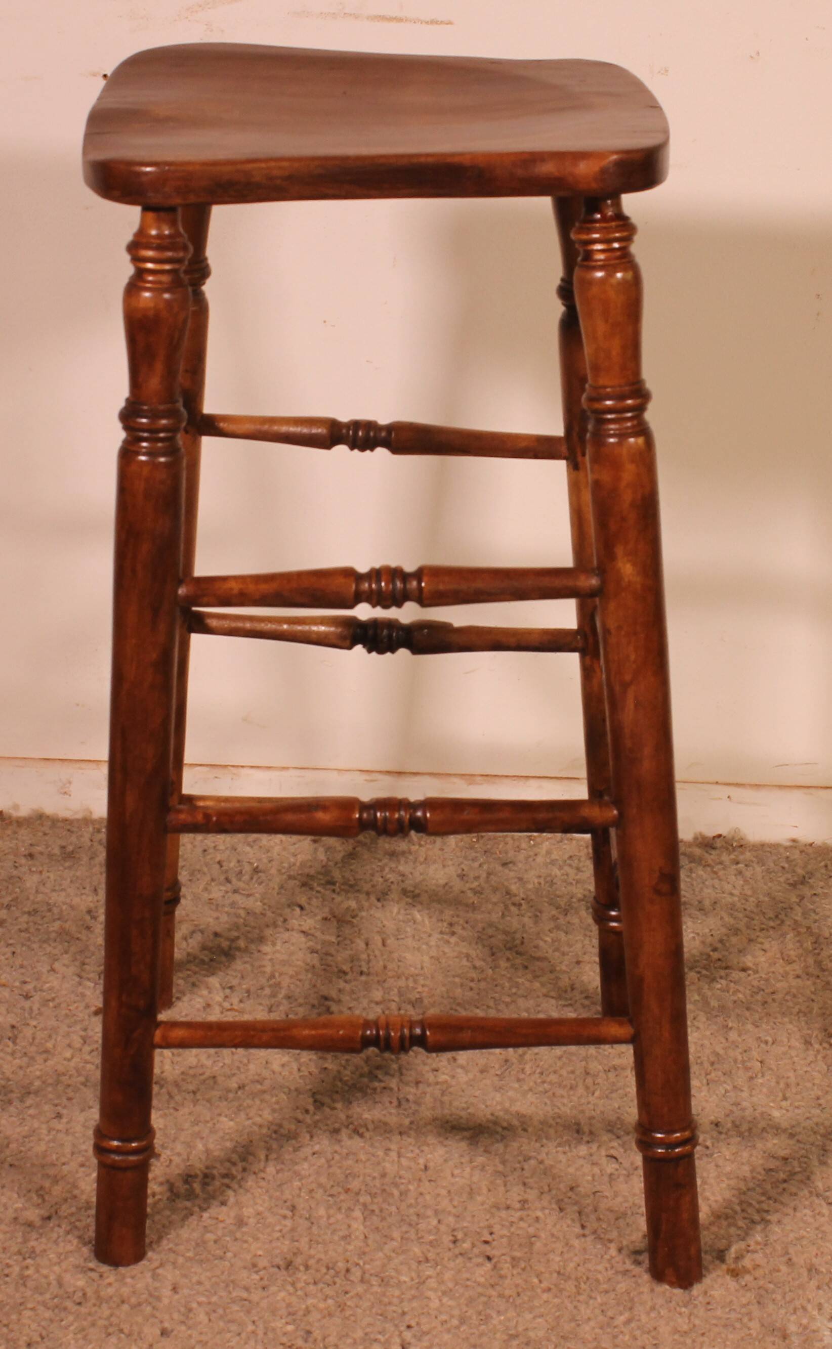 19th-century elm bar stool