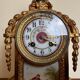 Napoleon III clock in gilded bronze and porcelain plates decorated and painted by hand