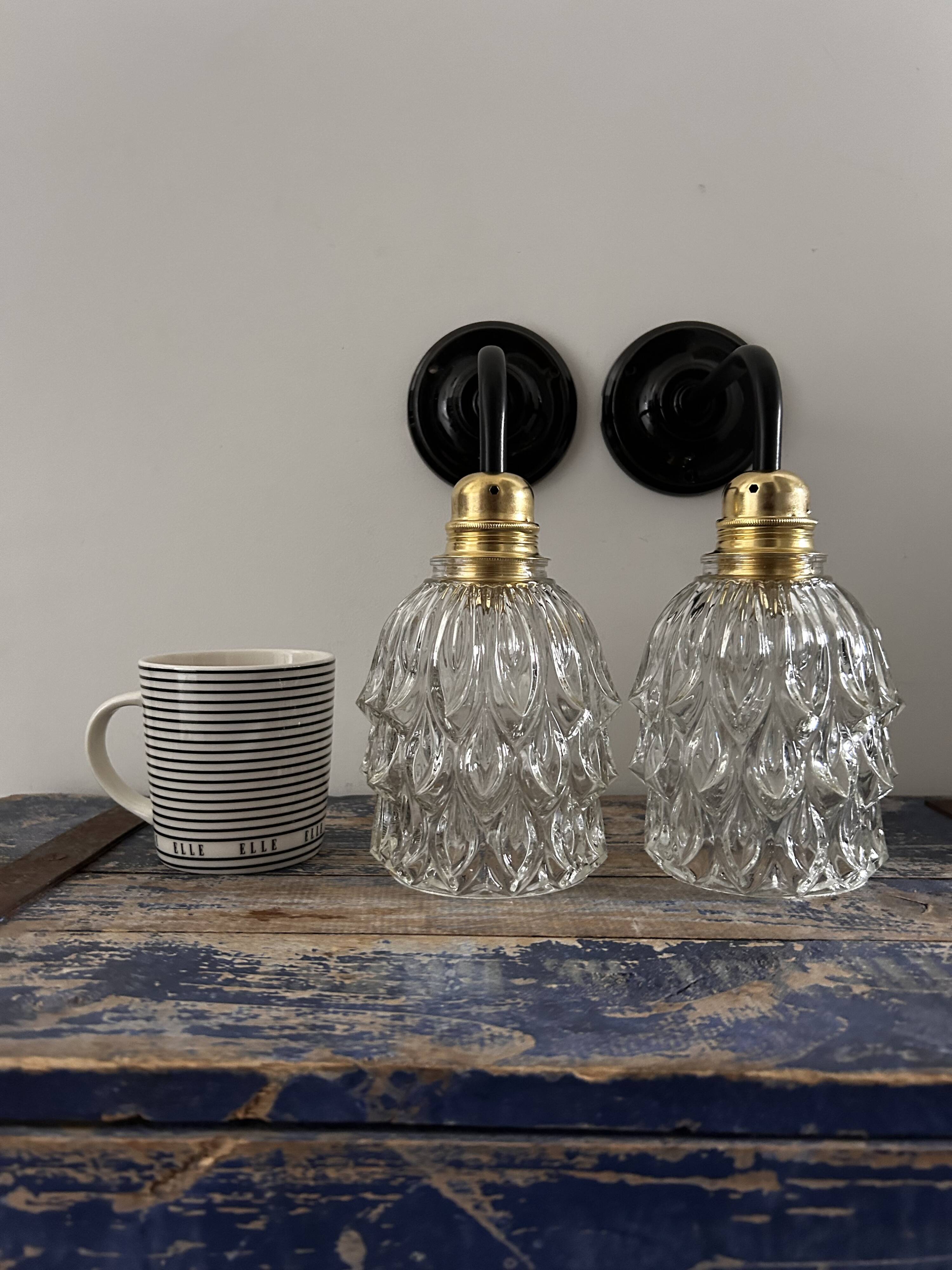 Pair of chiseled glass wall sconces