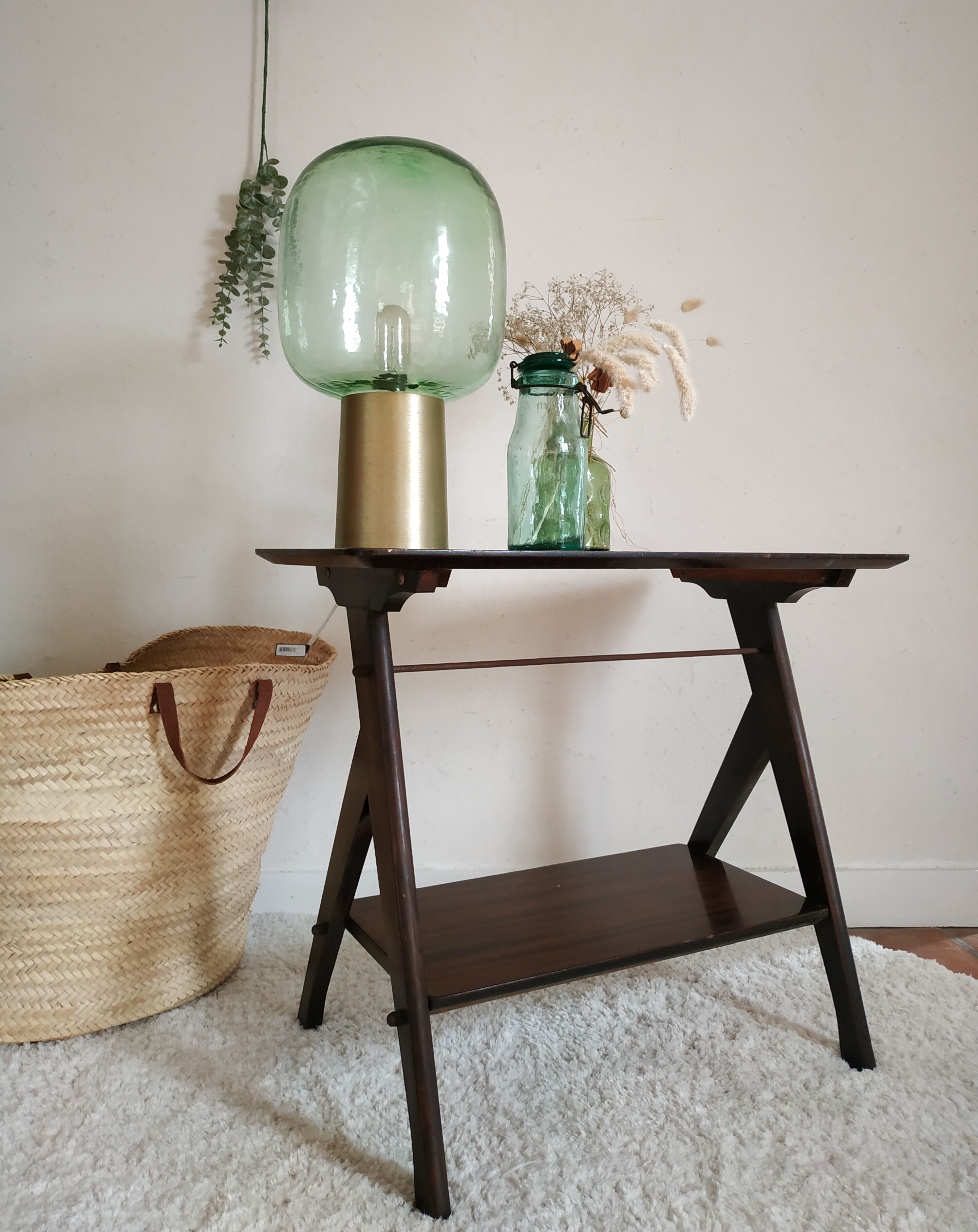 Dark wood console varnished compass feet