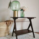 Dark wood console varnished compass feet
