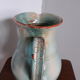 Pitcher with handle green celadon turquoise and caramel