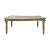 Carved and studded wooden table