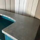 Old wooden trade counter with a zinc top.