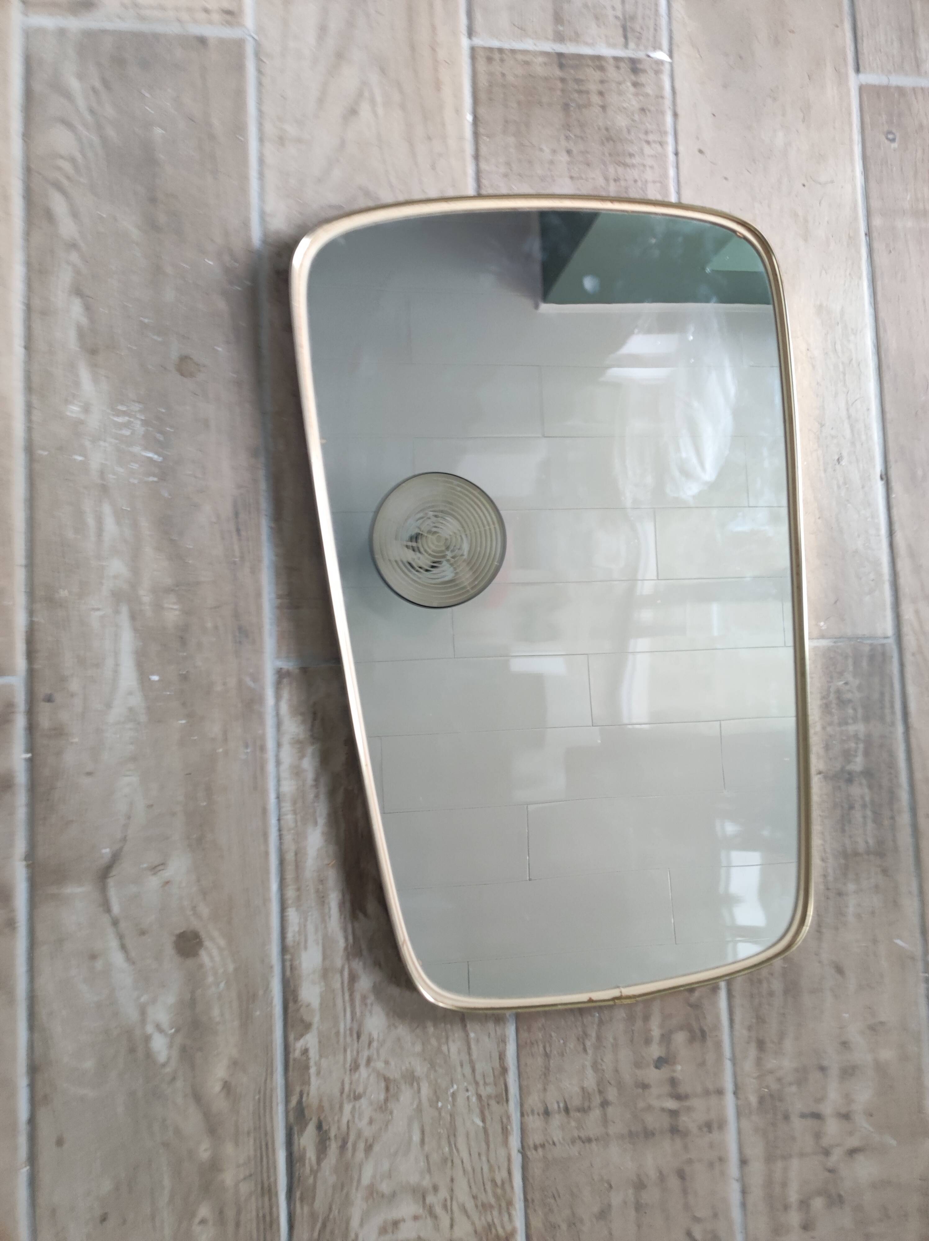 Asymmetrical mirror free-form rearview mirror