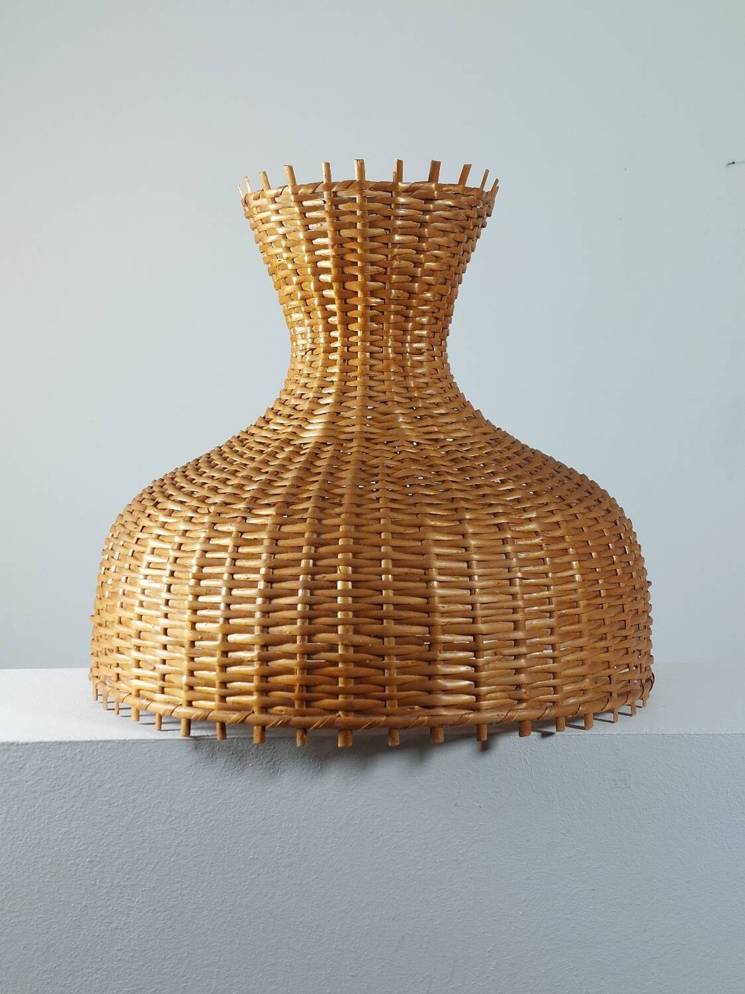 Vintage rattan lampshade from the 70s, mid-century style.