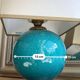 Elegant turquoise crackled ceramic ball lamp, on a br base