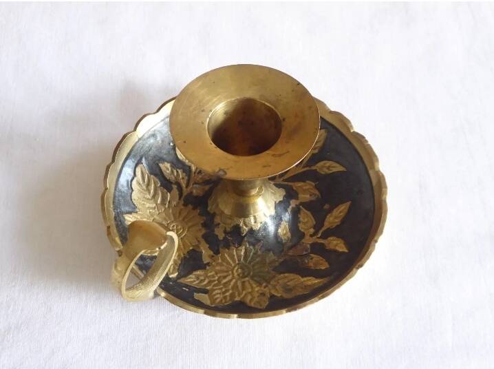 Brass hand candle holder