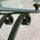Glass and metal console with antique patina