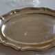 Silver-plated metal aperitif serving tray with HKE hallmark and glass.