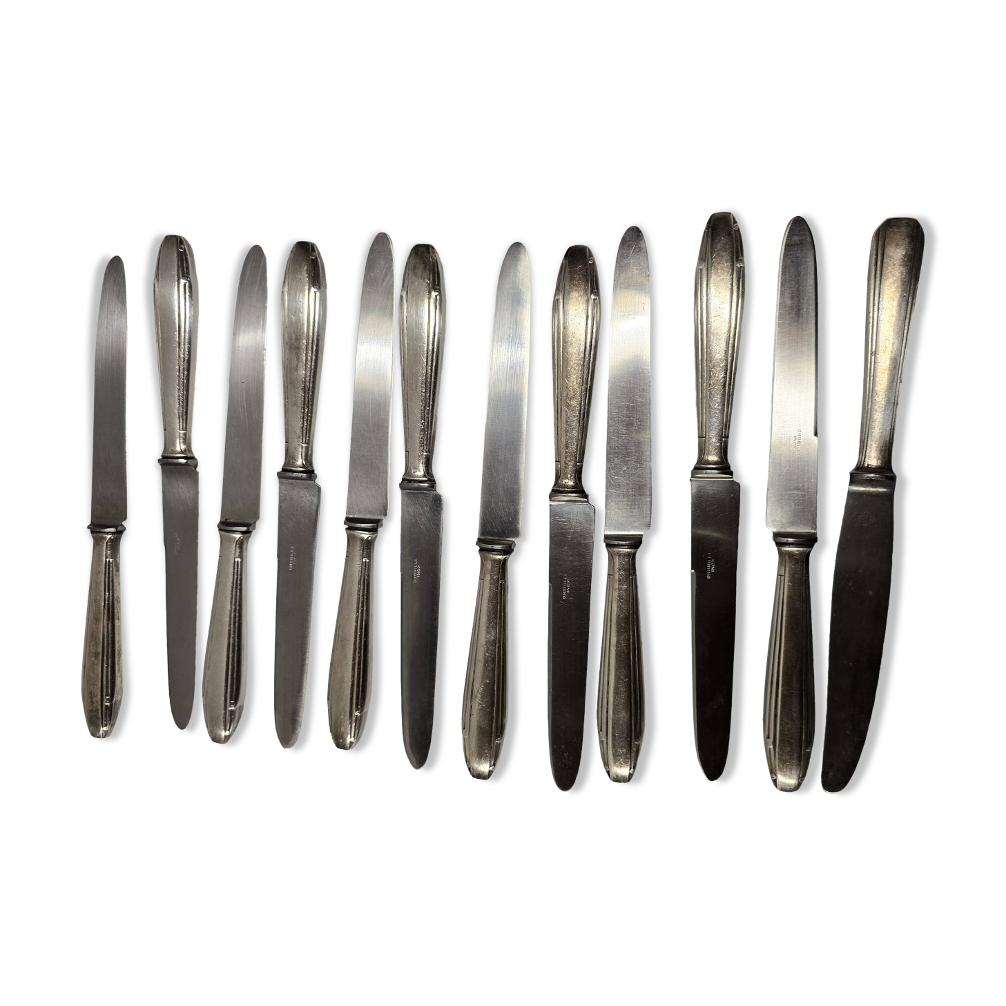 12 silver-plated knives from the mid-20th century