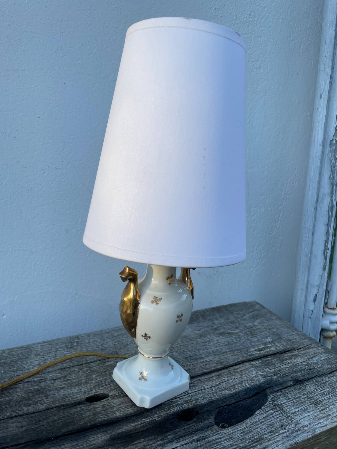 White and gold Limoges porcelain lamp