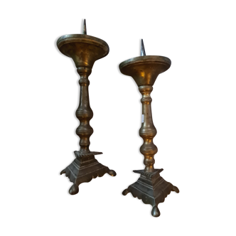 Pair of old brass candelabra