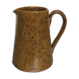 Milk pitcher in spotted sandstone